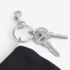 Astuccio da uomo con cerniera e ciondolo, nero Astuccio da uomo con cerniera e ciondolo, nero