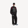 Balenciaga da uomo | Pantaloni della collaborazione con la NBA dal taglio oversize in nero/bianco