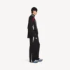 Balenciaga da uomo | Pantaloni della collaborazione con la NBA dal taglio oversize in nero/bianco
