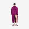 Body tecnico da donna a maniche lunghe in viola/arancione