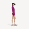 Body tecnico da donna a maniche lunghe in viola/arancione