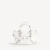 Borsa da donna Le City piccola con borchie giganti e strass in bianco ottico