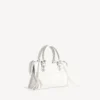 Borsa da donna Le City piccola con borchie giganti e strass in bianco ottico