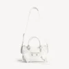 Borsa da donna Le City piccola con borchie giganti e strass in bianco ottico