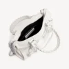 Borsa da donna Le City piccola con borchie giganti e strass in bianco ottico
