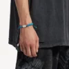 Bracciale Saint-Germain in pizzo nei colori turchese/nero/verde/argento lucido Bracciale Saint-Germain in pizzo nei colori turchese/nero/verde/argento lucido