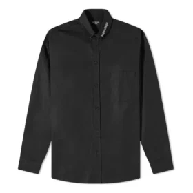 Camicia a maniche lunghe con bottoni e logo sul colletto “Nero” 671586TYB181000 Camicia a maniche lunghe con bottoni e logo sul colletto “Nero” 671586TYB181000