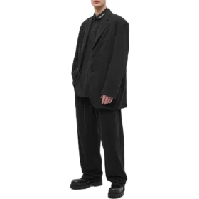 Camicia a maniche lunghe con bottoni e logo sul colletto “Nero” 671586TYB181000 Camicia a maniche lunghe con bottoni e logo sul colletto “Nero” 671586TYB181000