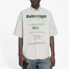Camicia da uomo Balenciaga in cotone a maniche corte e dal taglio ampio, grigia 664627TKM102967