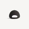 Cappellino con logo in nero/bianco Cappellino con logo in nero/bianco
