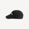 Cappellino da uomo “Messy Spray” in nero Cappellino da uomo “Messy Spray” in nero