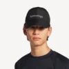Cappellino techwear da uomo in nero Cappellino techwear da uomo in nero