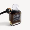 Ciondolo a forma di boccetta di profumo in miniatura, colore nero Ciondolo a forma di boccetta di profumo in miniatura, colore nero