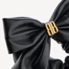 Elastico per capelli Clemence XL da donna in nero/oro