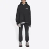 Felpa con cappuccio e zip, vestibilità ampia “Black” 674719TLVB49034
