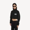 Giacca da tuta da donna corta in nero
