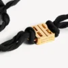 Girocollo da donna “nano ribbon bb” in nero/oro lucido Girocollo da donna “nano ribbon bb” in nero/oro lucido