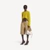Maglia da donna a girocollo corta in giallo scuro Maglia da donna a girocollo corta in giallo scuro