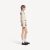 Maglione da donna con scollo a barchetta in blu navy/bianco