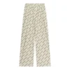 Pantaloni pigiama “Beige” con errore tipografico “Anno della Tigre” 681819TLLJ12599