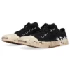 Paris Sneaker bassa con graffiti “Cotone strappato bianco e nero” 688757W3RR51099