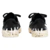 Paris Sneaker bassa “Cotone nero strappato e gomma bianca con graffiti” 688754W3RR51099