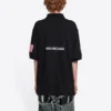 Polo da uomo Balenciaga x NASA Crossover FW21 in cotone con stampa spaziale, tinta unita, nera 662493TKVG11070