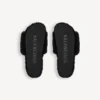 Sabot aperti da uomo con pelliccia in nero/bianco/rosso Sabot aperti da uomo con pelliccia in nero/bianco/rosso