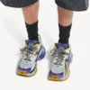 Sneaker da corsa da uomo nei colori viola/arancione/grigio