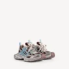 Sneaker da donna 3XL con intrecci nei colori marrone/beige/blu Sneaker da donna 3XL con intrecci nei colori marrone/beige/blu