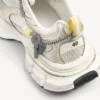 Sneaker da uomo 3XL con ciondoli nei colori bianco/giallo/argento/nero Sneaker da uomo 3XL con ciondoli nei colori bianco/giallo/argento/nero