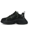Sneaker Triple S “Allover Logo – Nero e Giallo Fluo” 536737W2FA11070