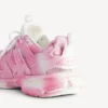 Sneakers da donna da Track con logo stampato in rosa/bianco