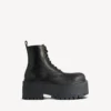 Stivaletti con plateau Strike da donna in nero Stivaletti con plateau Strike da donna in nero