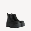 Stivaletti con plateau Strike da donna in nero Stivaletti con plateau Strike da donna in nero