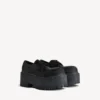 Stringate da donna con plateau Strike in nero Stringate da donna con plateau Strike in nero