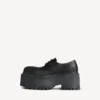 Stringate da donna con plateau Strike in nero Stringate da donna con plateau Strike in nero