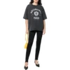 T-shirt a maniche corte con logo Varsity “Washed Black” 612966TMV981000