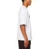 T-shirt con logo in script “Bianco/Nero” 612966TMVB49040