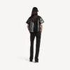 Pantaloni slim da donna in nero Pantaloni slim da donna in nero